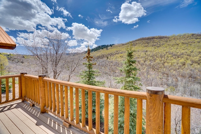 9174 Deer Creek Dr, Heber City, UT 84032 - wooden terrace featuring a wooded view