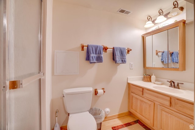 9174 Deer Creek Dr, Heber City, UT 84032 - bathroom featuring vanity, toilet, and a shower with door