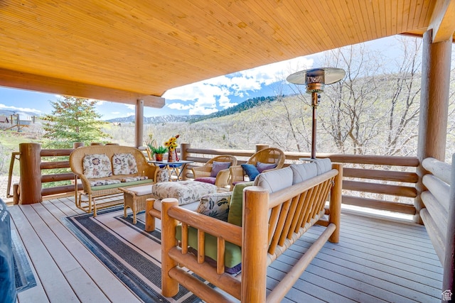 9174 Deer Creek Dr, Heber City, UT 84032 - deck featuring a mountain view and an outdoor living space