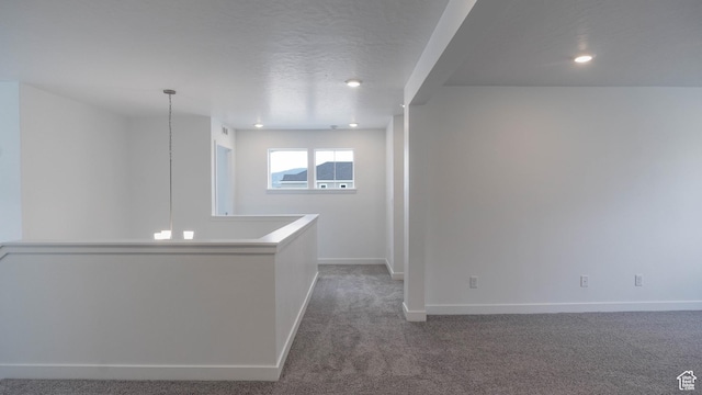 5488 N Trailside Unit 431, Eagle Mountain, UT 84005 - empty room with carpet flooring, baseboards, and recessed lighting