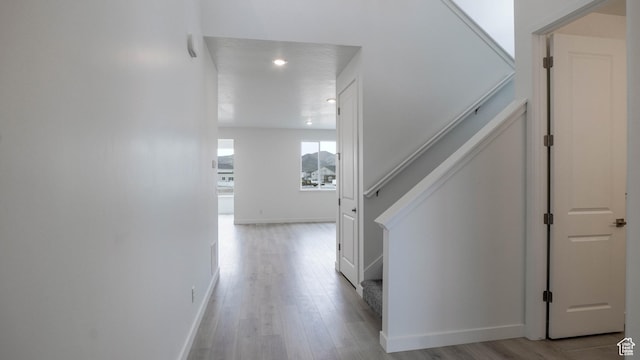 5488 N Trailside Unit 431, Eagle Mountain, UT 84005 - hall with stairway, baseboards, light wood-style floors, and recessed lighting