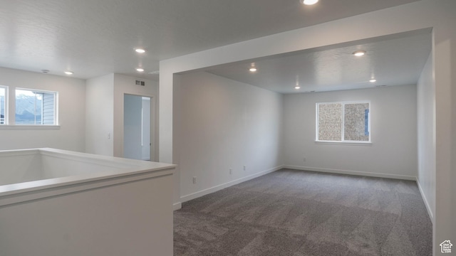 5488 N Trailside Unit 431, Eagle Mountain, UT 84005 - spare room featuring carpet floors, recessed lighting, and baseboards
