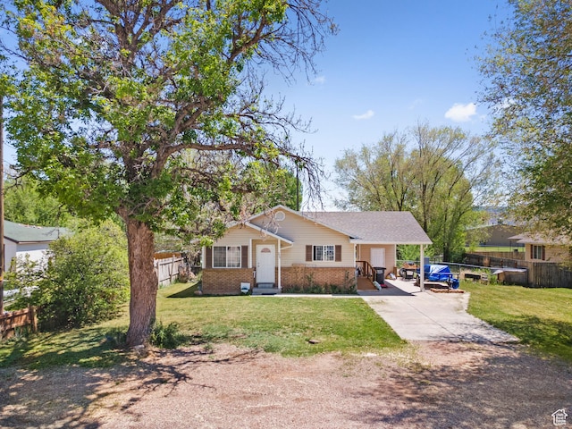 view of front of home with brick siding and concrete driveway