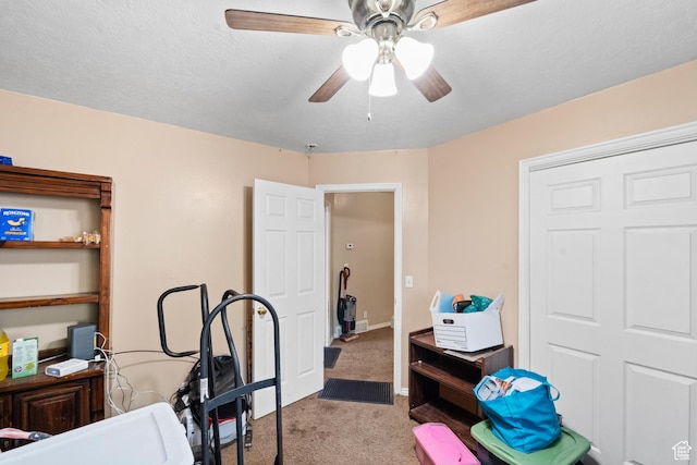 bedroom featuring carpet flooring, a ceiling fan, and baseboards
