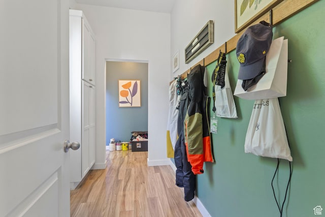 10243 S Silver Mine Rd W, South Jordan, UT 84009 - mudroom with light wood finished floors and baseboards