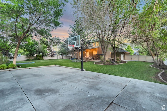 view of sport court with basketball hoop