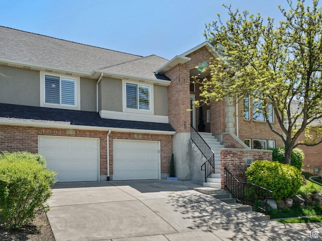426 E Brayden Way, Draper, UT 84020 - view of property with driveway, a garage, stucco siding, stairs, and roof with shingles