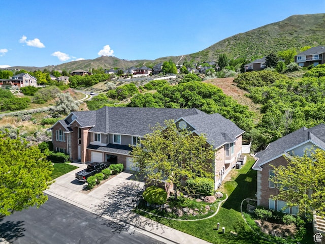 aerial perspective of suburban area featuring mountains