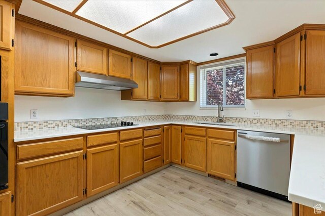 754 W 2100 N, Provo, UT 84604 - kitchen with stainless steel dishwasher, a sink, under cabinet range hood, light wood-style floors, and light countertops