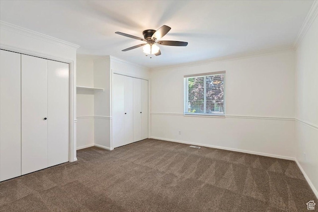 754 W 2100 N, Provo, UT 84604 - unfurnished bedroom featuring carpet flooring, ornamental molding, multiple closets, baseboards, and ceiling fan