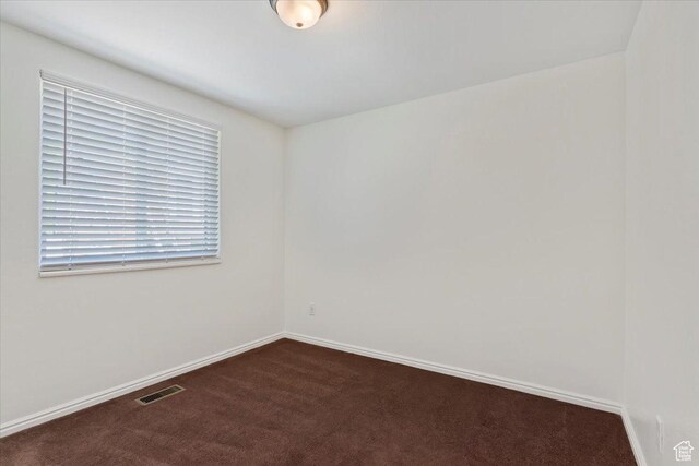 754 W 2100 N, Provo, UT 84604 - unfurnished room featuring dark colored carpet and baseboards