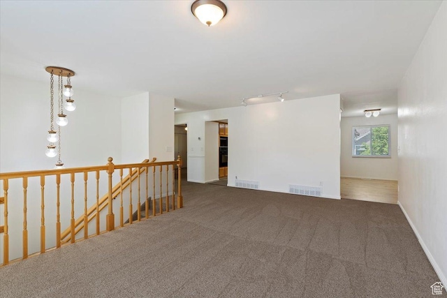 754 W 2100 N, Provo, UT 84604 - empty room featuring carpet floors and rail lighting