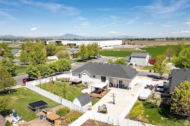 aerial perspective of suburban area featuring a mountain backdrop
