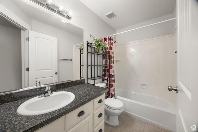 full bathroom featuring tile patterned flooring, toilet, vanity, and shower / tub combo with curtain