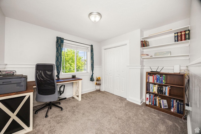 office area featuring carpet floors and wainscoting