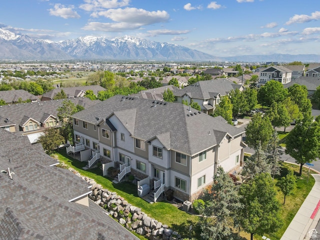 aerial view of residential area with a mountain backdrop