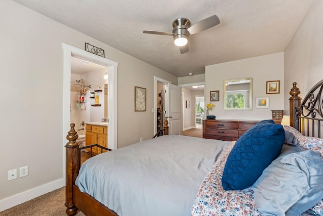 bedroom featuring carpet flooring, baseboards, ceiling fan, and connected bathroom