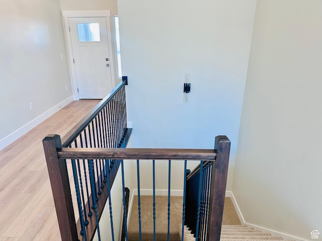 566 W 1860 N, Tooele, UT 84074 - staircase featuring baseboards and wood finished floors