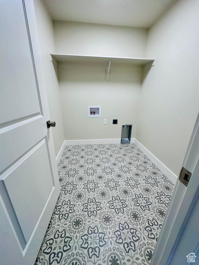 566 W 1860 N, Tooele, UT 84074 - laundry room featuring washer hookup, baseboards, and tile patterned floors