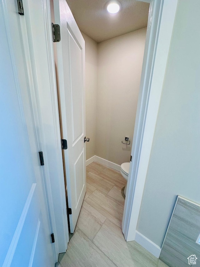 566 W 1860 N, Tooele, UT 84074 - bathroom featuring toilet and baseboards