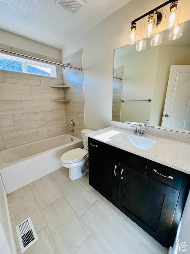 566 W 1860 N, Tooele, UT 84074 - full bathroom with toilet, vanity, shower / bathtub combination, and a textured ceiling
