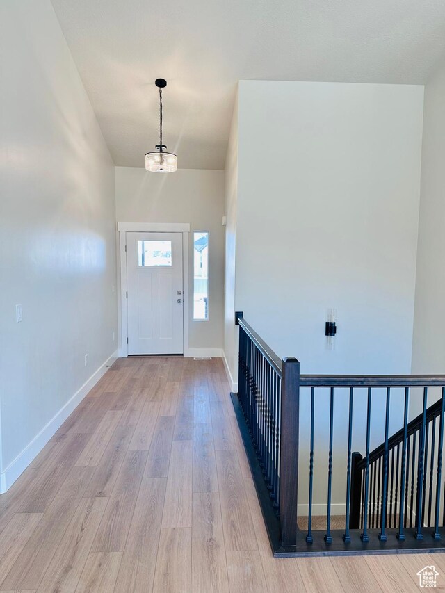 566 W 1860 N, Tooele, UT 84074 - foyer featuring wood finished floors and baseboards