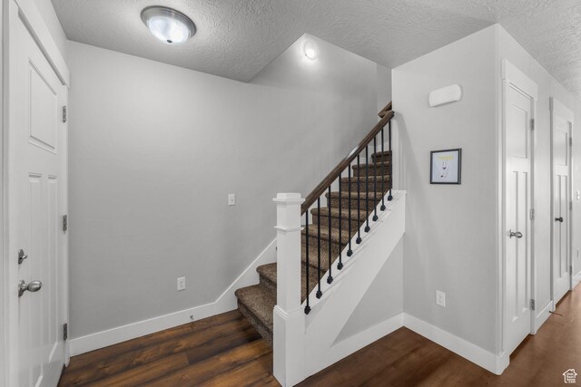 2051 W 1080 N, Provo, UT 84604 - stairway with baseboards, wood finished floors, and a textured ceiling