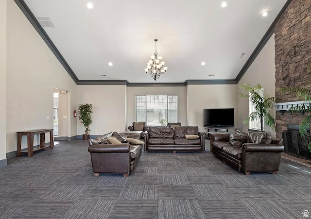 2051 W 1080 N, Provo, UT 84604 - living area featuring dark carpet, ornamental molding, a chandelier, recessed lighting, and a stone fireplace