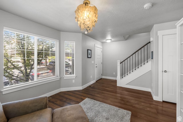 2051 W 1080 N, Provo, UT 84604 - foyer featuring stairs, wood finished floors, baseboards, a textured ceiling, and a chandelier
