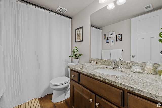2051 W 1080 N, Provo, UT 84604 - full bath with toilet, vanity, and a textured ceiling