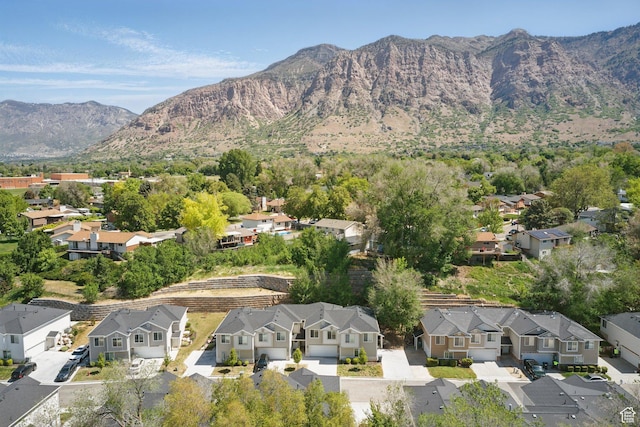 view of mountain backdrop with nearby suburban area