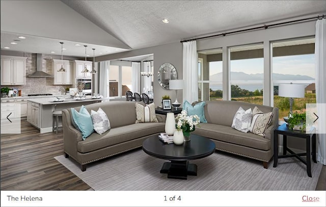 394 W 1225 N Unit 3, Harrisville, UT 84404 - living room with healthy amount of natural light, vaulted ceiling, dark wood-style flooring, recessed lighting, and a textured ceiling