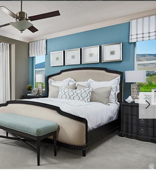 394 W 1225 N Unit 3, Harrisville, UT 84404 - carpeted bedroom featuring ornamental molding and ceiling fan