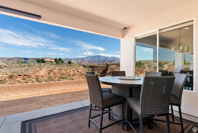 921 N Camino Pico N, Washington, UT 84780 - view of patio / terrace with a mountain view and outdoor dining space