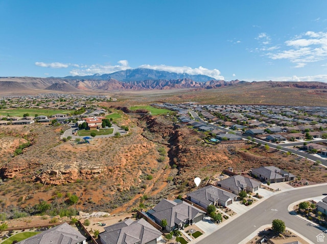 921 N Camino Pico N, Washington, UT 84780 - aerial view of property's location featuring nearby suburban area and a mountain backdrop