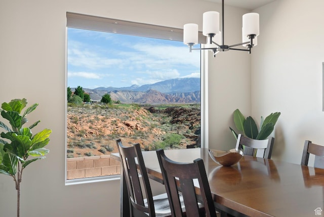 921 N Camino Pico N, Washington, UT 84780 - dining area with a chandelier, a mountain view, and plenty of natural light