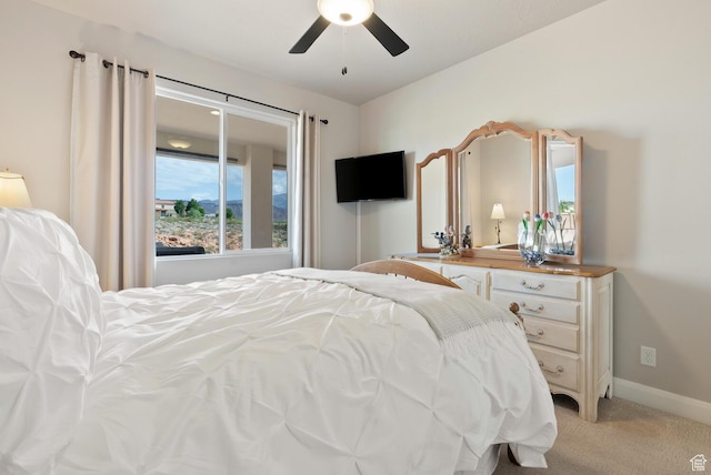 921 N Camino Pico N, Washington, UT 84780 - bedroom with light colored carpet, baseboards, and a ceiling fan