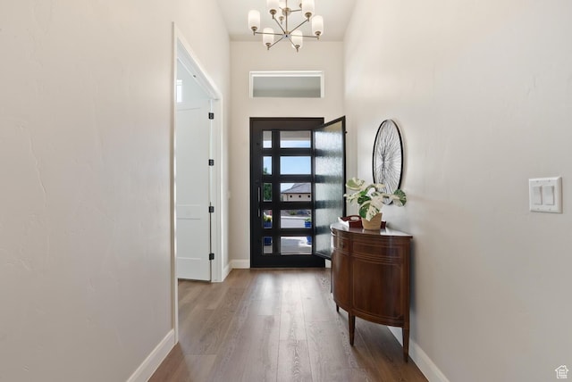 921 N Camino Pico N, Washington, UT 84780 - entrance foyer with baseboards, a chandelier, and wood finished floors