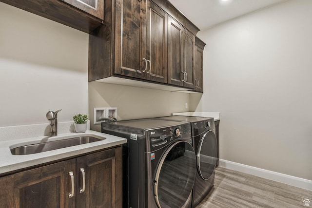 750 W 1860 N, Washington, UT 84780 - laundry room with cabinet space, washer and clothes dryer, light wood-style floors, and baseboards