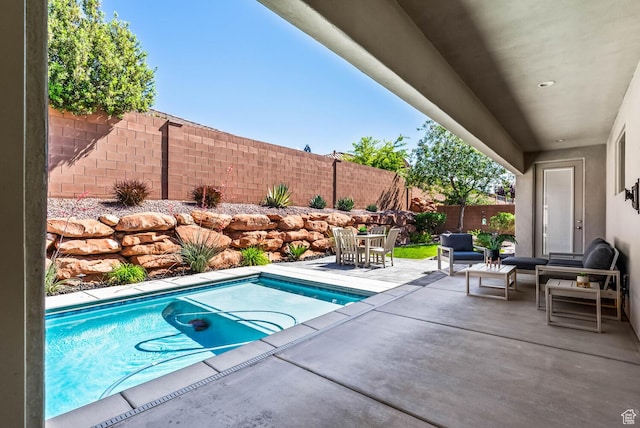 750 W 1860 N, Washington, UT 84780 - view of swimming pool featuring a fenced backyard, a patio, an outdoor hangout area, and outdoor dining area