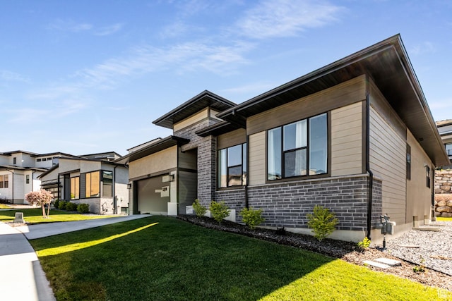 5502 N Valley Rd W, Lehi, UT 84043 - view of front facade with a garage, driveway, a front yard, and brick siding