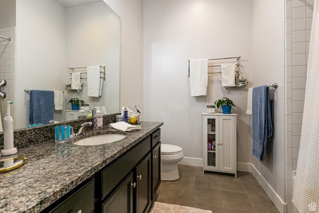 5502 N Valley Rd W, Lehi, UT 84043 - full bathroom with vanity, toilet, baseboards, and tile patterned floors