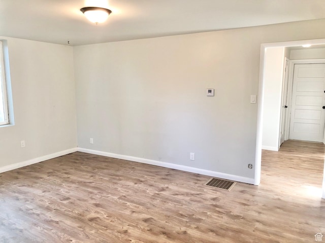 600 S Main St, Kaysville, UT 84037 - spare room featuring wood finished floors and baseboards