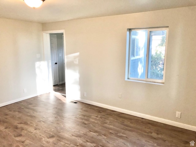 600 S Main St, Kaysville, UT 84037 - empty room with wood finished floors and baseboards