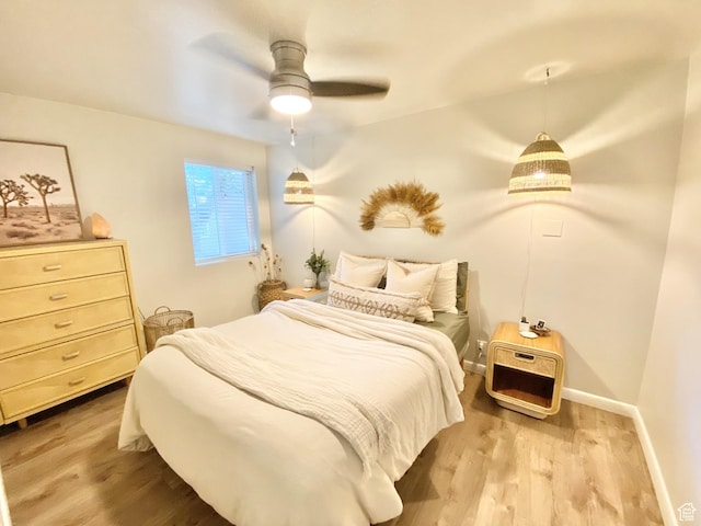 600 S Main St, Kaysville, UT 84037 - bedroom with wood finished floors, baseboards, and ceiling fan
