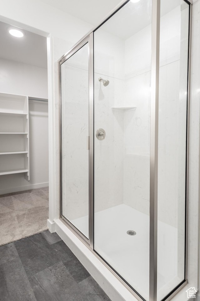 3786 S 4250 W Unit 427, West Haven, UT 84401 - bathroom featuring a stall shower, a spacious closet, and recessed lighting