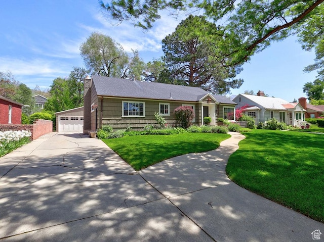 single story home with a chimney, a detached garage, and a front lawn