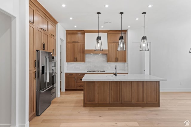 kitchen featuring stainless steel appliances, extractor fan, tasteful backsplash, light wood-style flooring, and recessed lighting