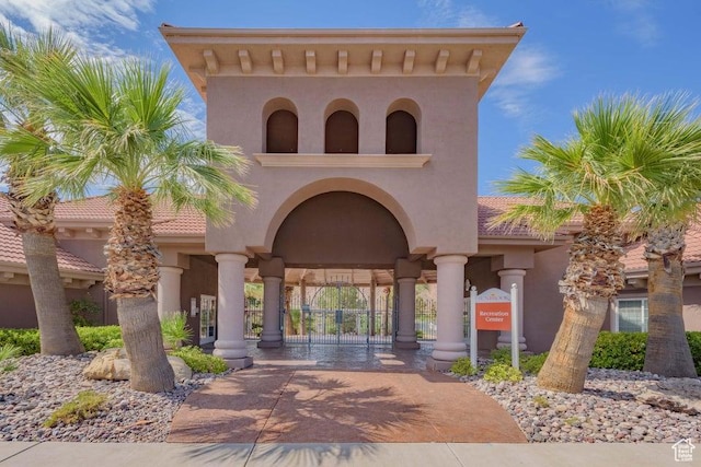 view of building exterior featuring fence