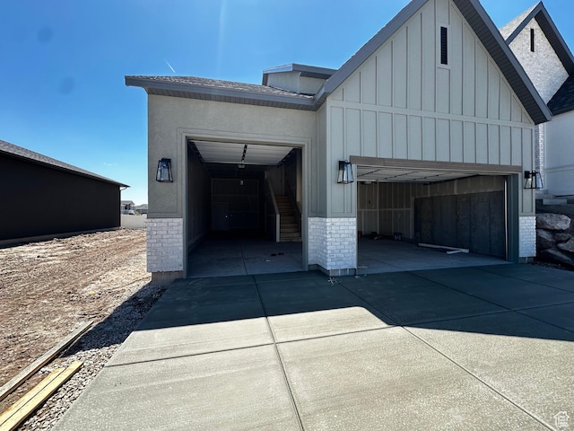 garage featuring driveway